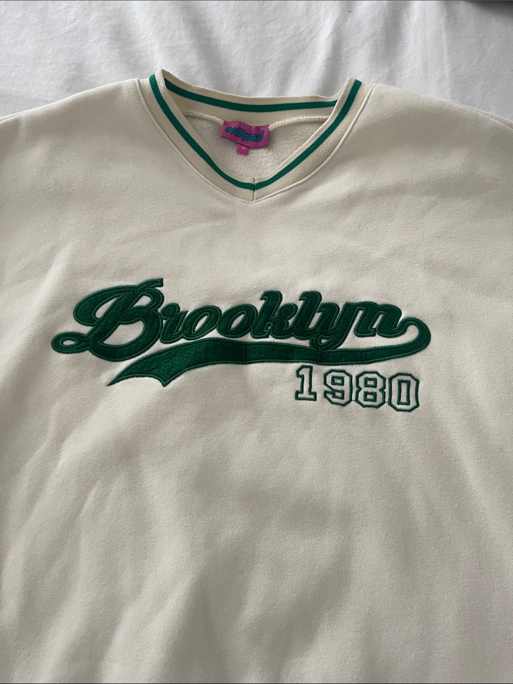 Edikted Cream Sweatshirt with Green Stripe Collar & All Around